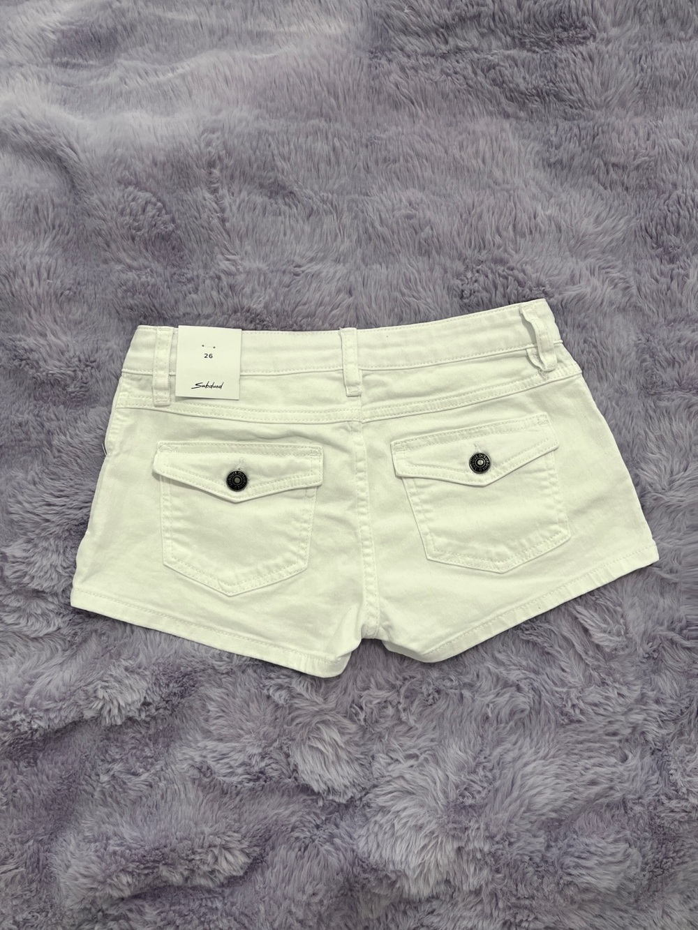 subdued low waist white shorts pockets with buttons y2k vintage